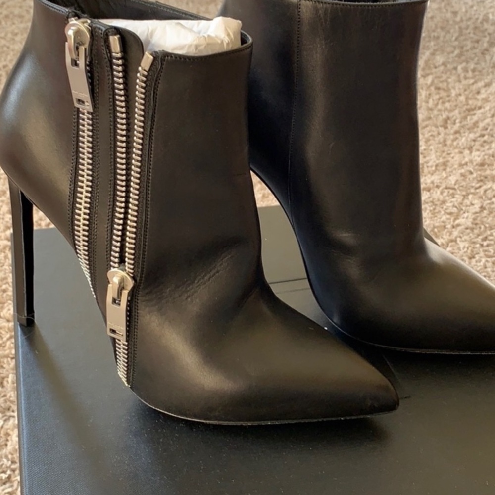 Saint Laurent black heeled booties.